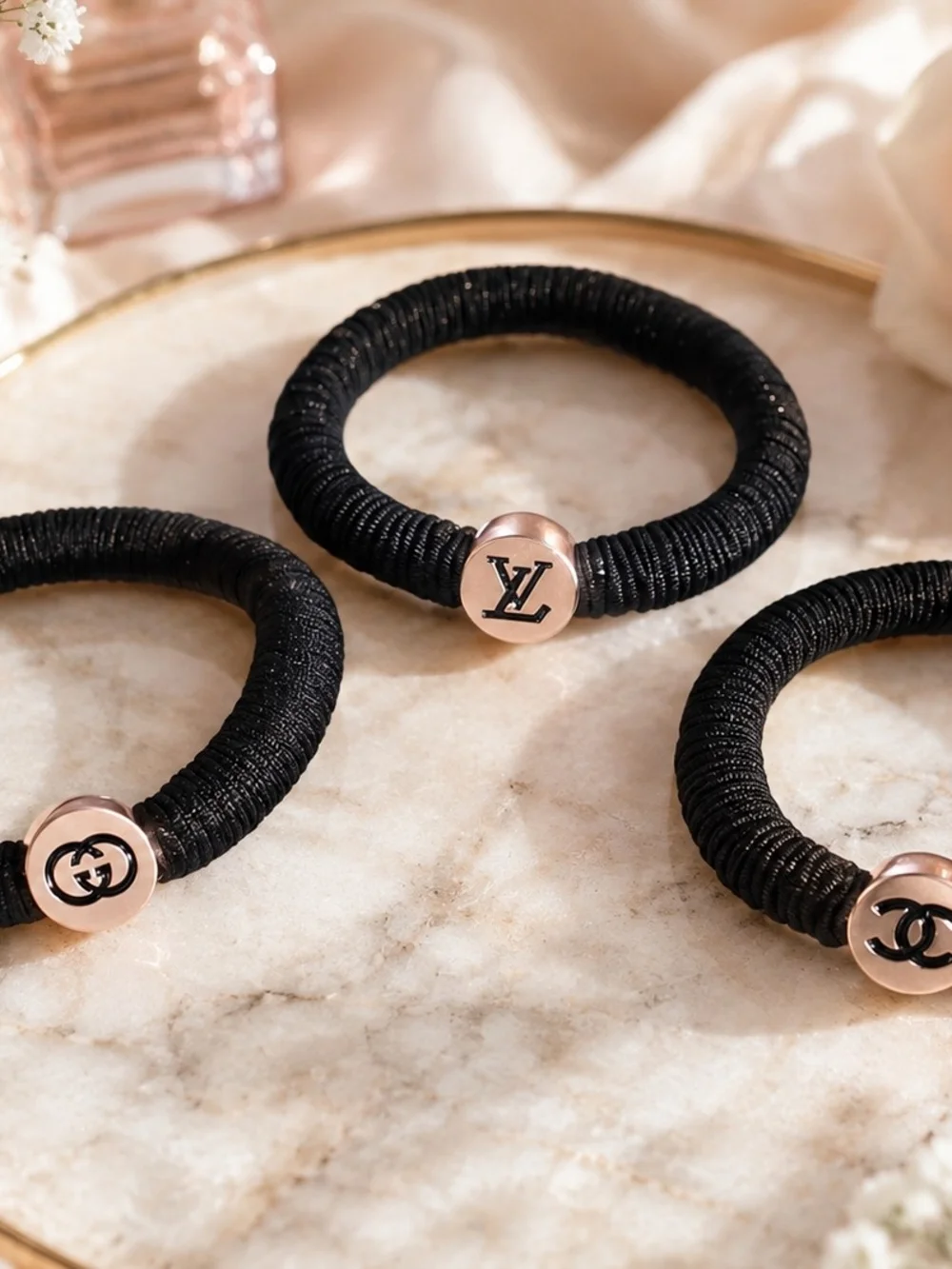 Black Elastic Hairtie with Logo Medallion